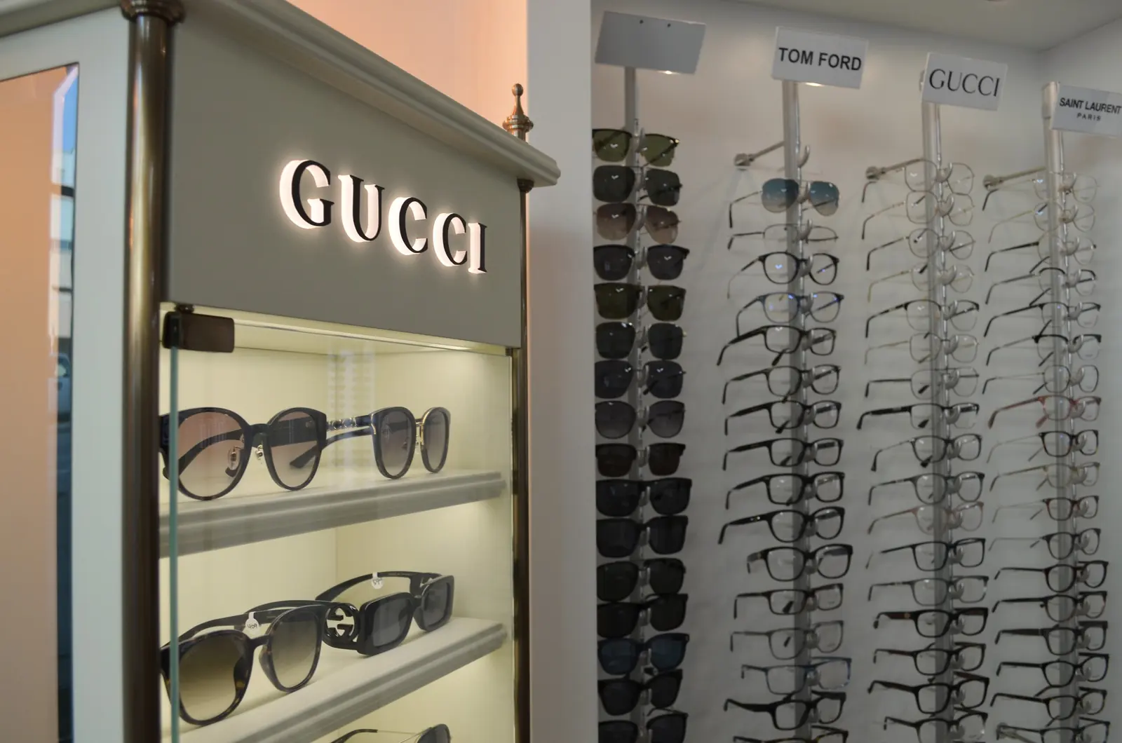 Lit designer sunglass display and frame rods in The EyeSite optical